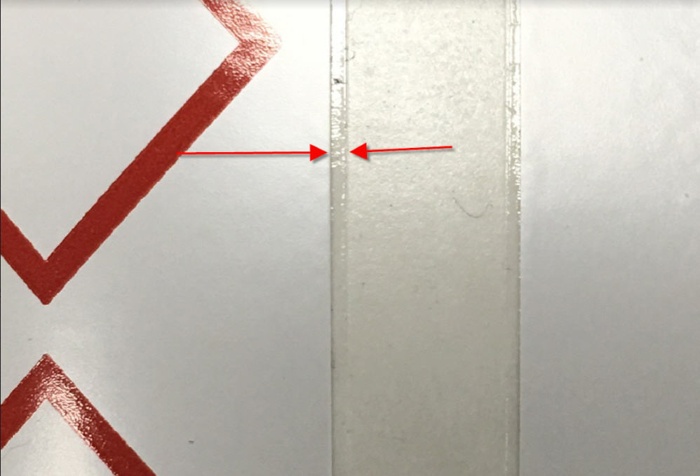 Adhesive Bleeding/ Label Sticking on Die Cut Material | Brady Support